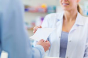 Customer Getting Prescription - Northeast Pharmacy